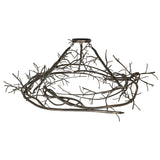 Angled view of sculptural branch-inspired Gardner chandelier.