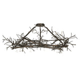 Side profile of chandelier showing layered branch framework.