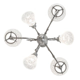 Bottom view of chandelier showing symmetrical six-arm layout and shade openings.