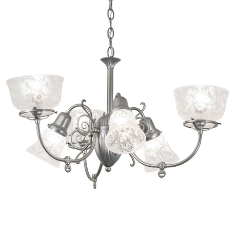 Lit view of 6 light chandelier with light sandstone finish and clear textured glass shades.