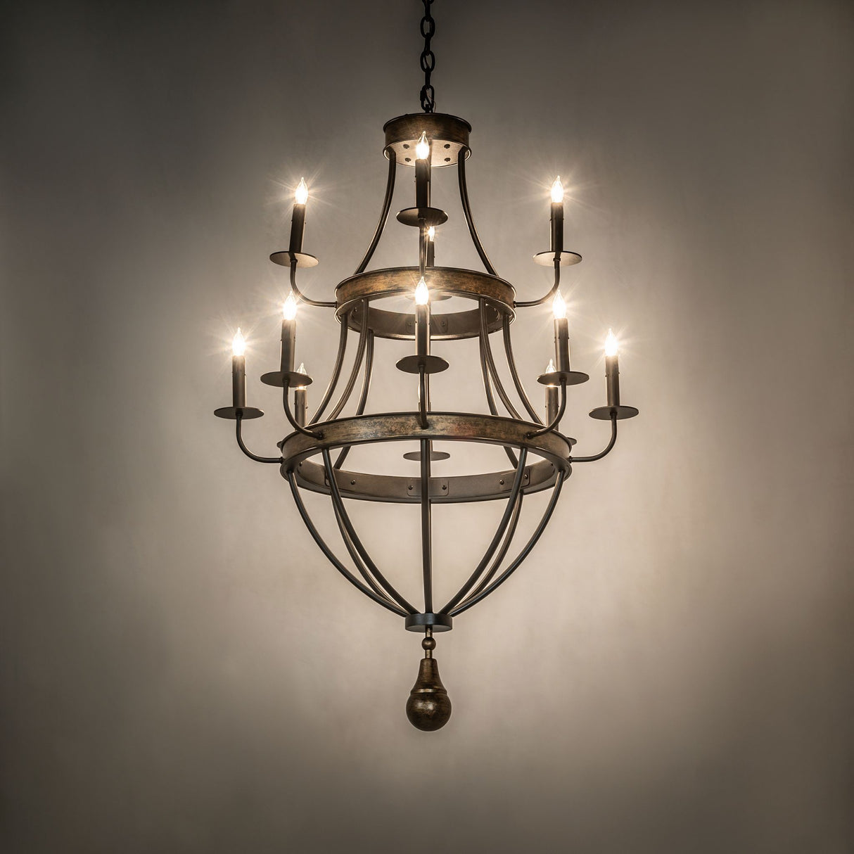 Georgetown 12 light chandelier illuminating interior with warm candle-style glow.