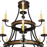 Close-up of chandelier rings with faux candle-lights and gold accents.