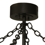 Close-up of dark bronze ceiling canopy and chain suspension hardware.
