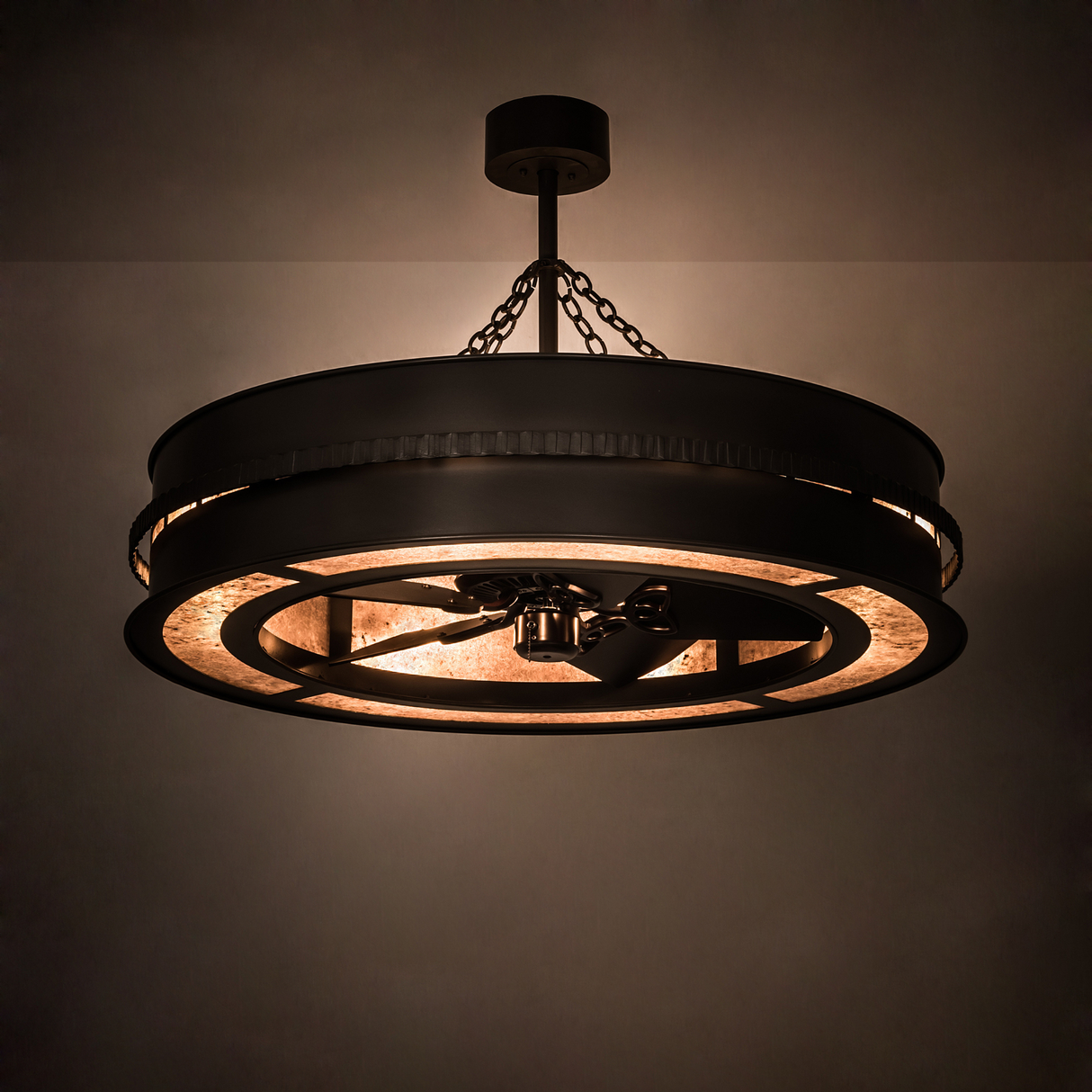 Golden Forge Chandel-Air illuminated in a dark room with warm mica light.
