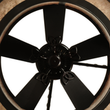 Lower angle view revealing fan blades and soft interior illumination.