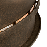 Close-up of hammered metal band and mica slot detailing on Golden Forge Chandel-Air.