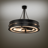 Chandelier fan softly lighting room with industrial black satin finish.
