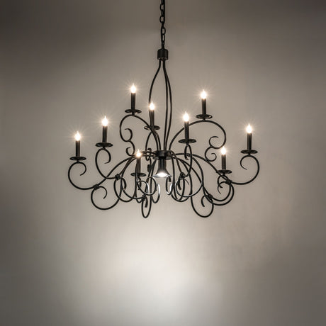 Satin black Grace chandelier installed in dark room setting.