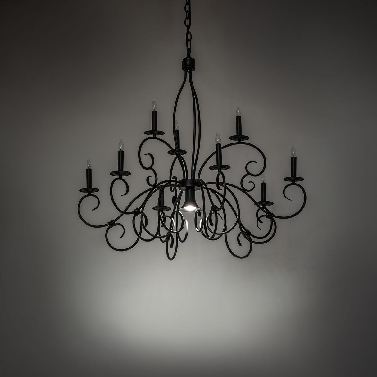 Grace chandelier with center downlight illuminated.