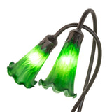 Closeup of the Green Tiffany Pond Lily lamp’s emerald green fluted glass shades.