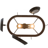 Bottom view showing two illuminated downlights and cookware arrangement.