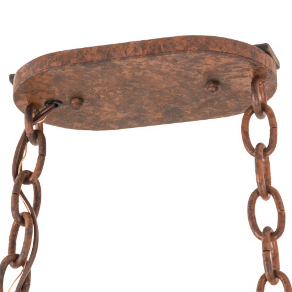 Close-up of ceiling canopy and chain hardware in rustic finish.