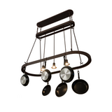 Side view showing slim profile and hanging cookware.