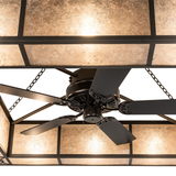 Close-up of integrated fan and inner light reflections on mica surface.