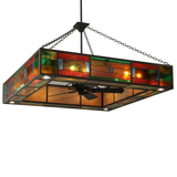 Bottom view showing colorful stained glass panels illuminated