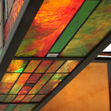 Underside angle view showing warm amber mica and glass detailing.