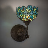 Illuminated view of 8" Wide Nightfall Wisteria wall sconce, highlighting vivid colors.