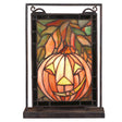 Jack O'Lantern lighted tabletop window with autumn leaves and pumpkin design.