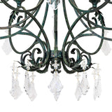 Closeup of crystal pendalogues detail on chandelier with Golden Verde finish.