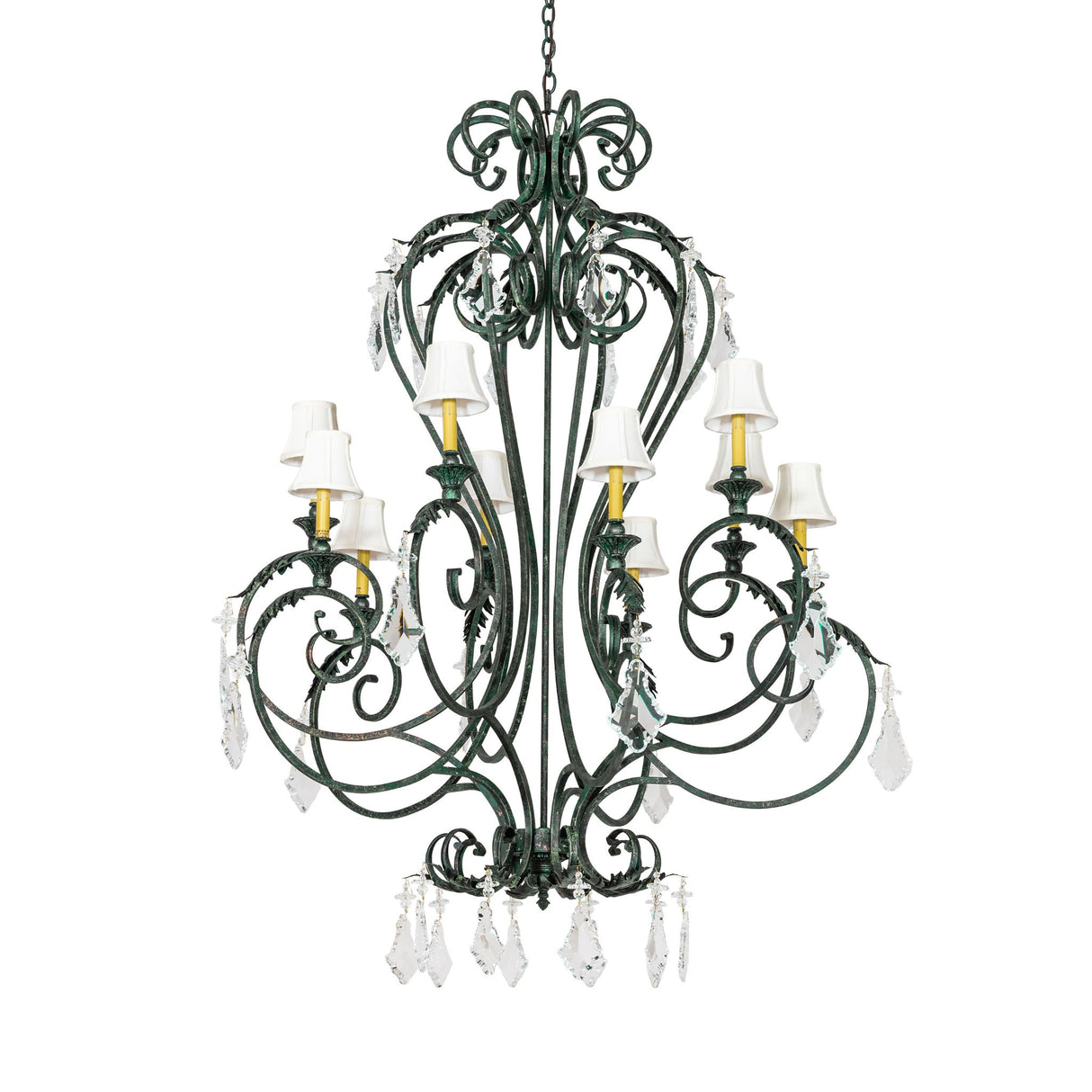 Unlit view of 10-light chandelier showcasing scrolled metalwork and crystals.
