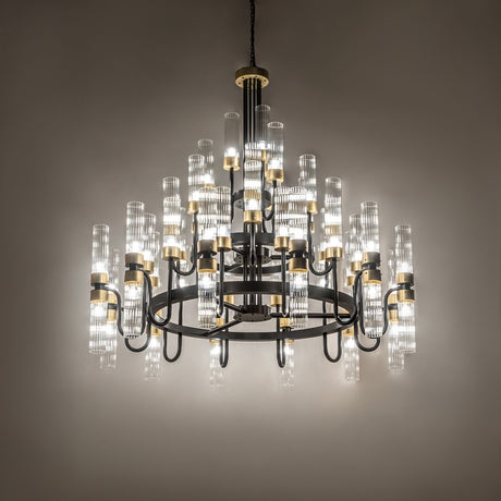 Kahler 54 light chandelier lit in ambient room setting with soft glow.