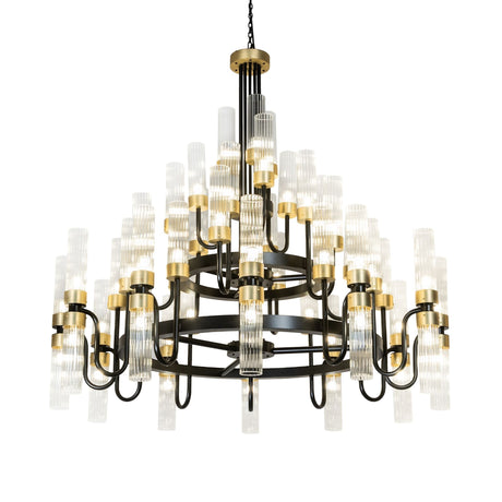 Lit view of Kahler 54 light chandelier with black and brass finish.