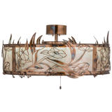 Side lit view highlighting floral cutouts and soft mica glow.