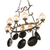 Laramie chandelier angled view, lights softly illuminating cookware.