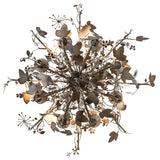 Underside view of Lau Lau 8 light chandelier showing leaf and arm structure.
