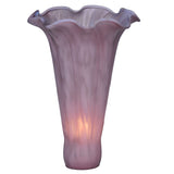 Lit view of lavender pond lily glass shade with fluted ruffled edge.