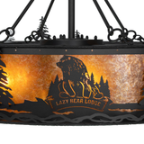 Close-up of Lazy Bear Lodge logo etched on amber mica diffuser.