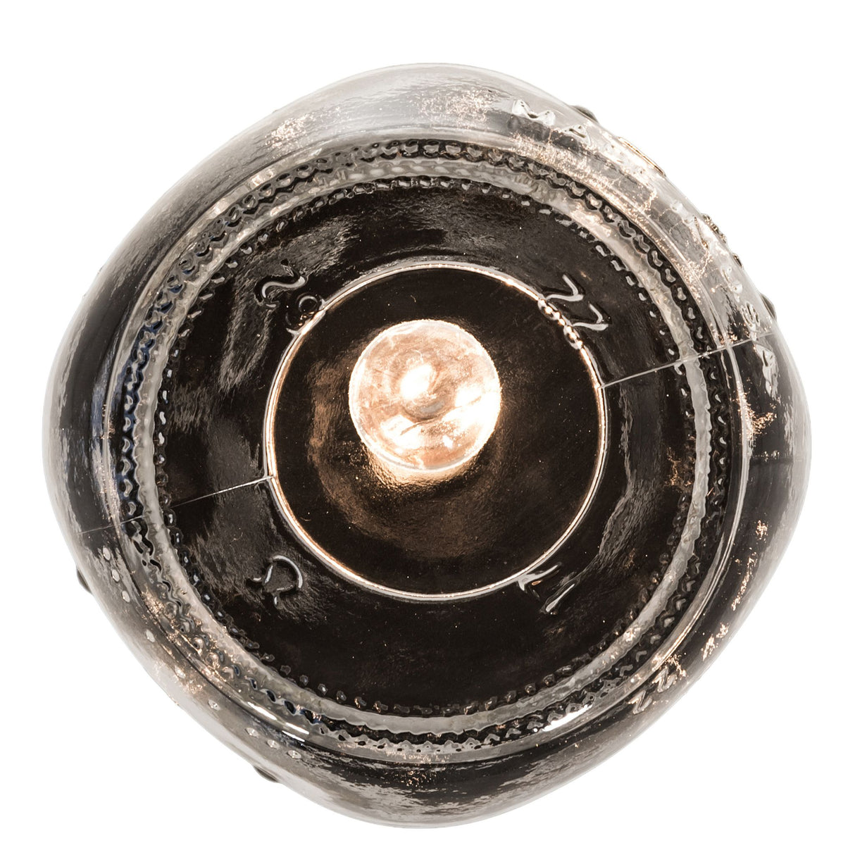 Bottom view of lit mason jar pendant showcasing filament bulb.