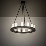 Ambient view of the chandelier, illuminated in a dark room setting.