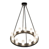 Angled view of chandelier showing the circular ring and glass cylinders.