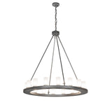 Lit view of the 16 light chandelier with frosted glass cylinders.