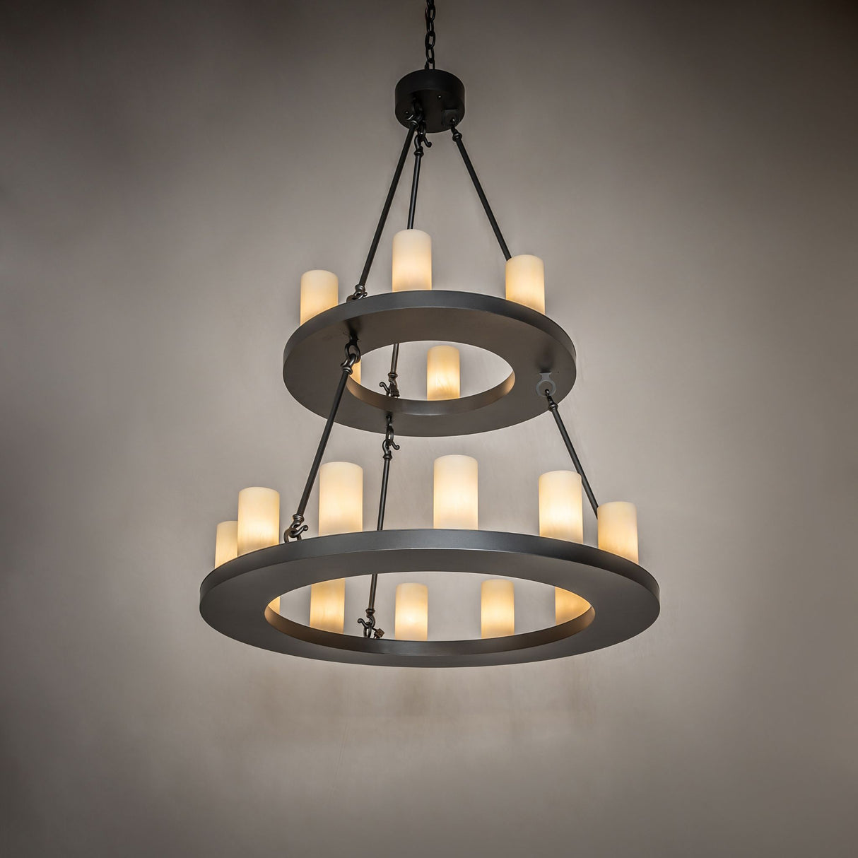 Ambient view of the Loxley 18 light two tier chandelier creating a warm, elegant glow.