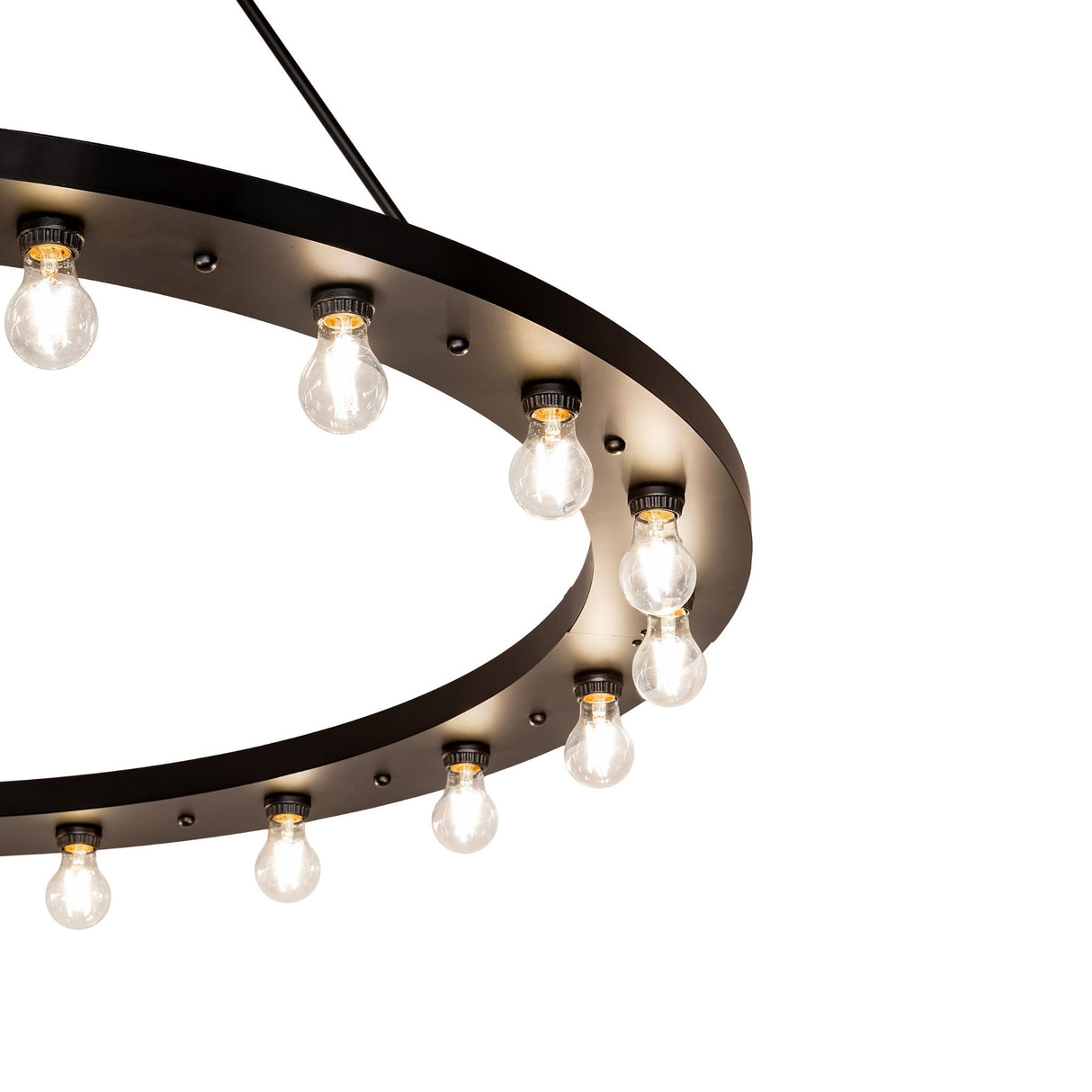 Detailed view of Edison-style bulbs mounted along the solar black metal ring.