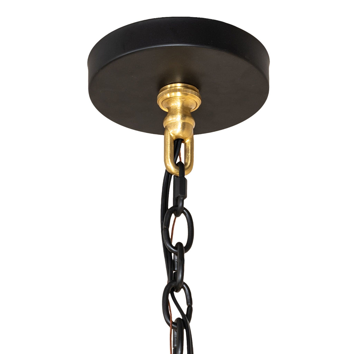 Close-up of 20 light chandelier canopy with chain, suspension rods, and brass hardware.