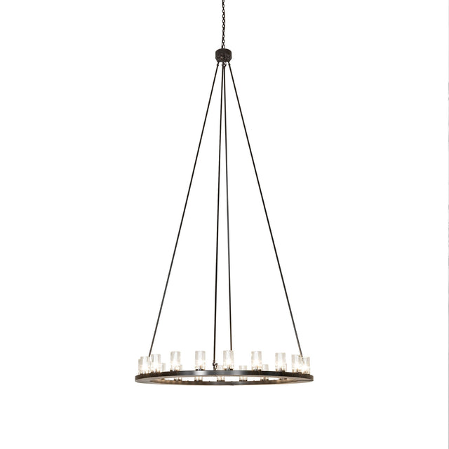 Lit view of the chandelier with clear glass cylinder shades and bronze finish.