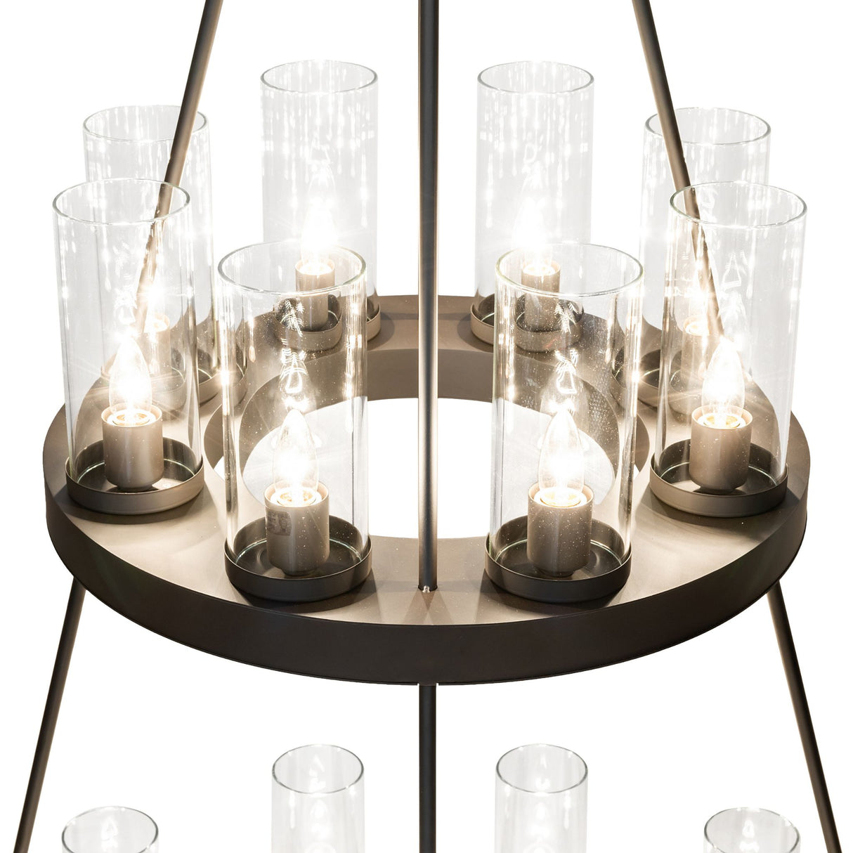 Close-up of glass cylinder lights mounted on bronze chandelier ring.