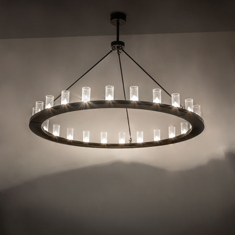 Loxley 24-light chandelier installed, glowing seeded glass cylinders creating warm ambient illumination.