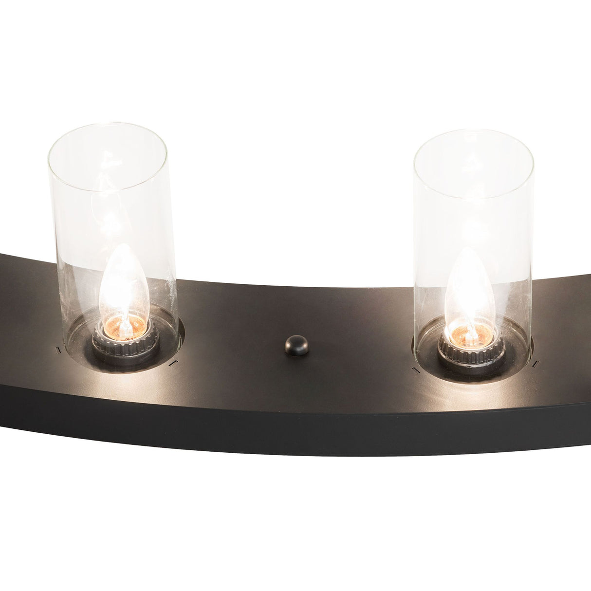 Detailed closeup of chandelier highlighting glass cylinder, bulb, and metal finish.