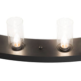 Detailed closeup of chandelier highlighting glass cylinder, bulb, and metal finish.