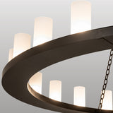 Closeup of ring frame with frosted glass cylinder light shades on chandelier.