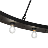 Close-up of black metal ring with mounted Edison bulbs on chandelier.