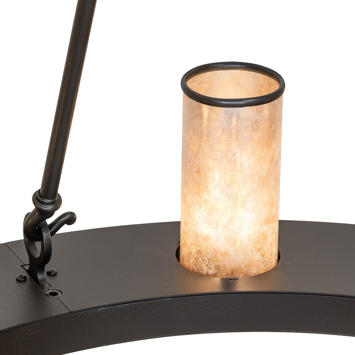 Close-up of Loxley chandelier silver mica cylinder shade texture and illumination detail.