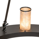 Close-up of Loxley chandelier silver mica cylinder shade texture and illumination detail.