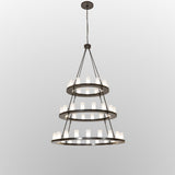 Full view of the chandelier showing metal ring, suspension rods, and glass shades.