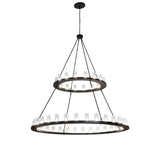 Full view of two tier chandelier with 48 lit seeded glass cylinders.
