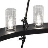 Close-up of seeded glass cylinders and mounting hardware on chandelier.